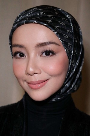 Mira Filzah's poster